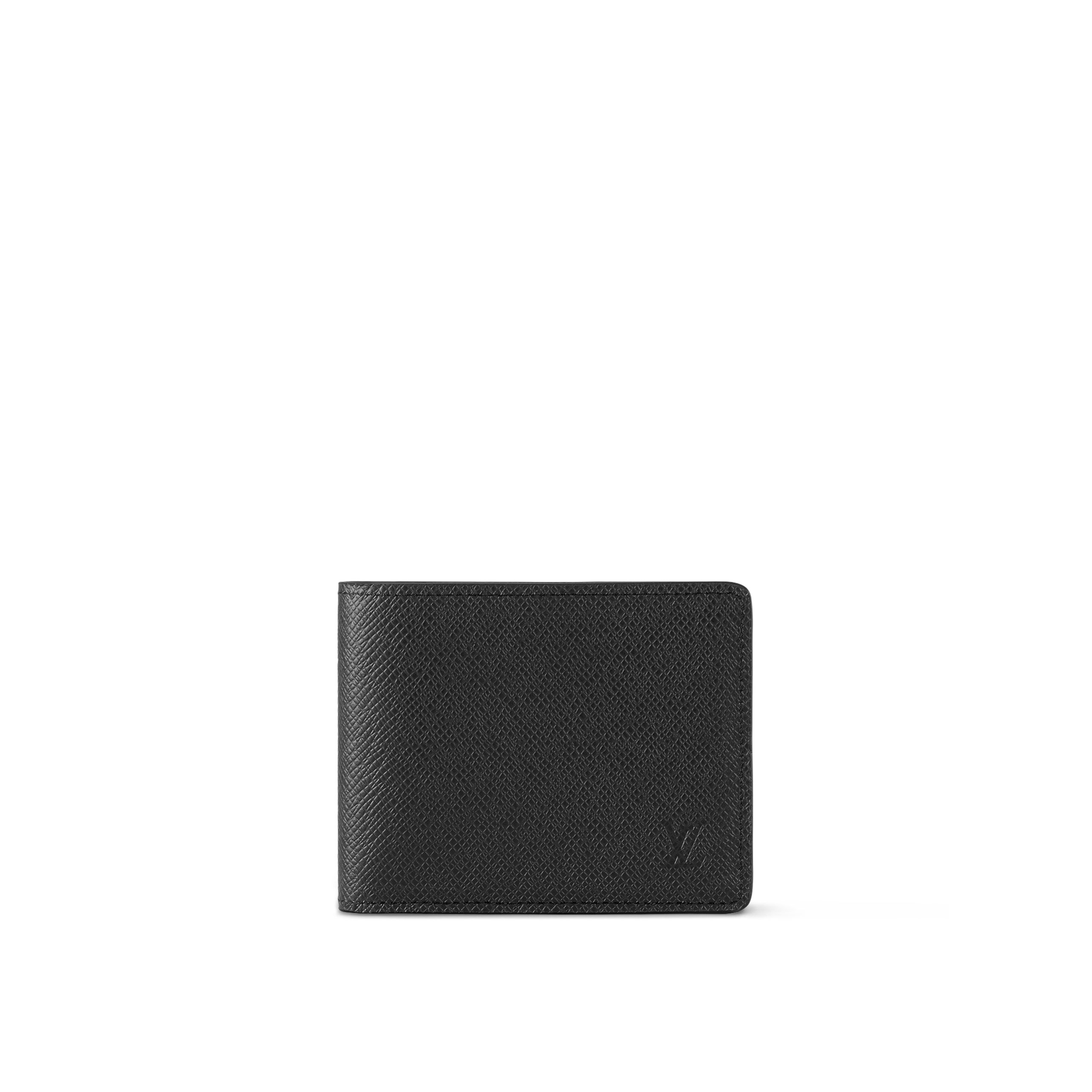 louis-vuitton-slender-wallet-taiga-leather-personalization-M30539_PM2_Front_20view.jpg Louis Vuitton M30539 SLENDER WALLET Taiga Leather - Image 1